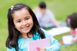 Portrait of a cute girl looking happy at the school-1
