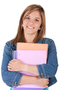 Teenage female student holding notebooks - isolated over white